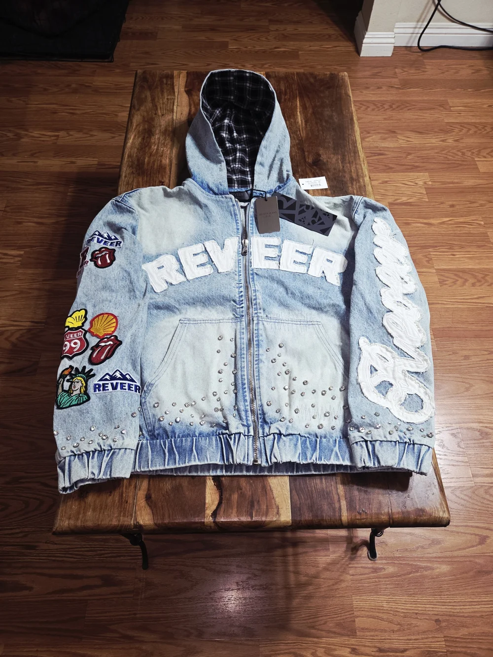 Reever Jeans Men's Denim Jacket W/ Light Blue Wash And Full Patchwork. Size XL.